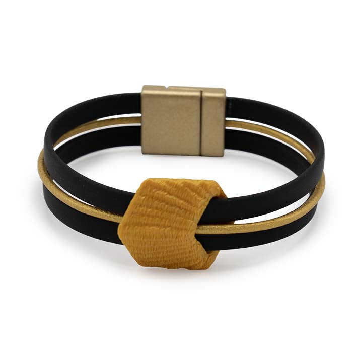 Vooraanzicht Cube armband Golden Rays met zwart rubber en goudkleurig leer, Fates