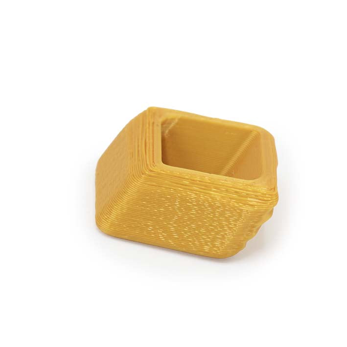 Onderkant van de Golden Rays Spacer met glanzende structuur