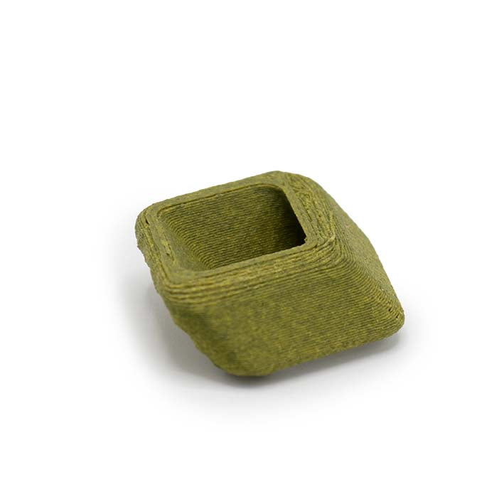 Onderkant van de groene Green Stone Rays Spacer met matte, gespikkelde structuur